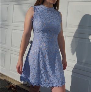Sleeveless light blue high neck lace dress